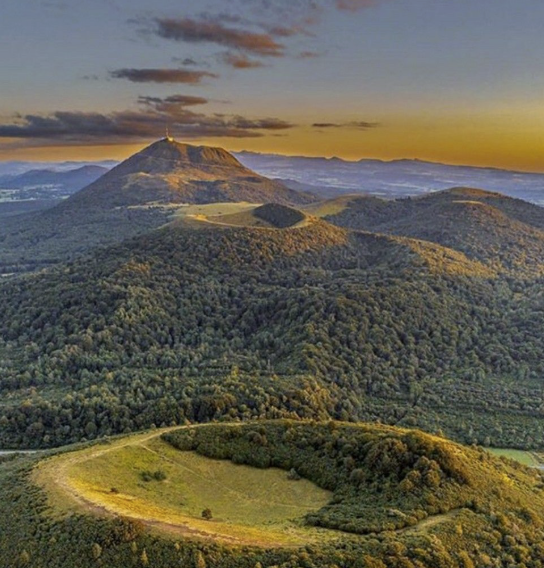 Aerial view of the dormant volcano chain in Auvergne at sunrise
